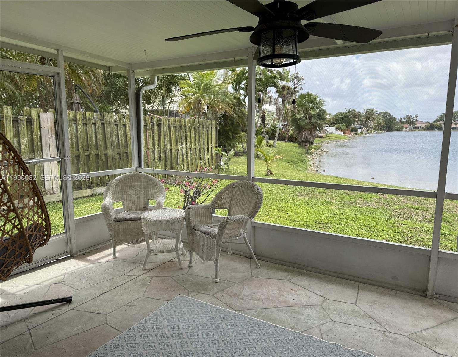 3091 Lighthouse Place Margate, FL 33063 - Photo 30 of 38 a balcony with furniture and a garden