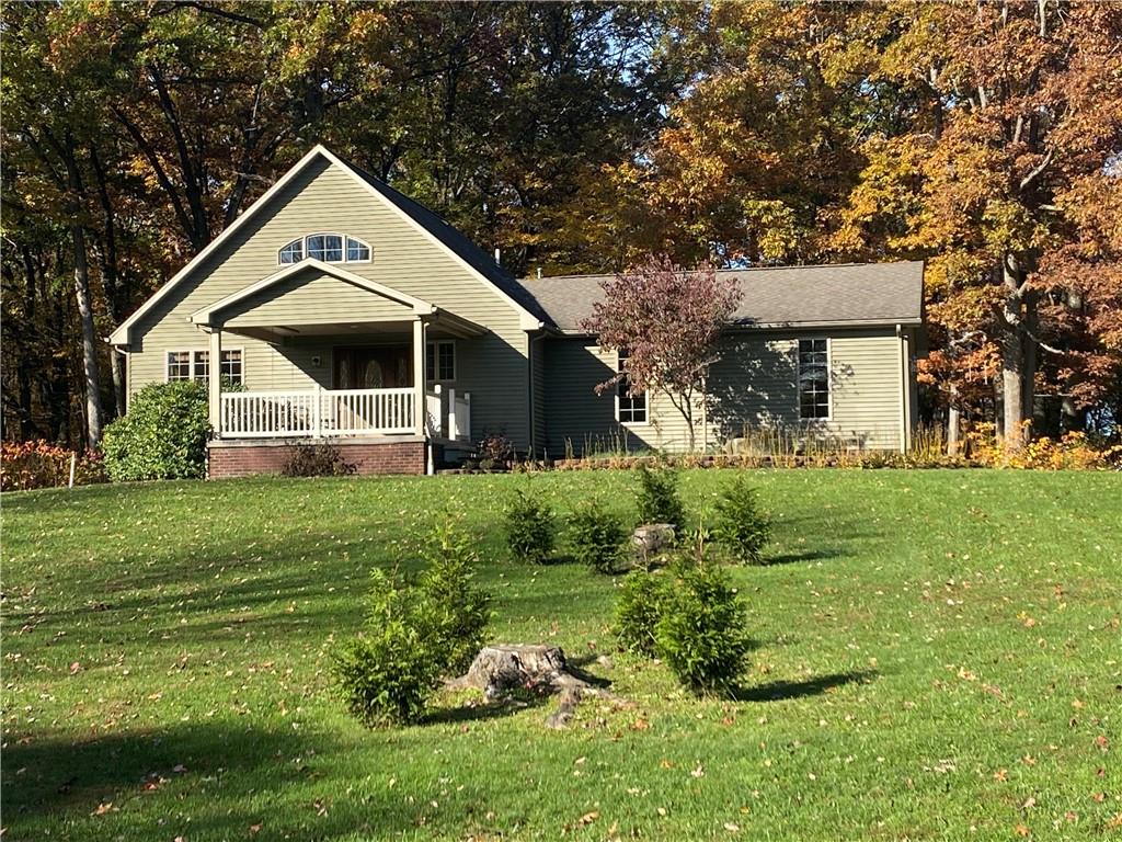 250 Lowman Road Indiana, PA 15701 - Photo 1 of 11 a front view of a house with a yard