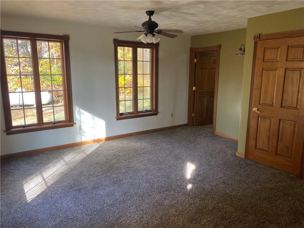 250 Lowman Road Indiana, PA 15701 - Photo 4 of 11 an empty room with windows and entryway