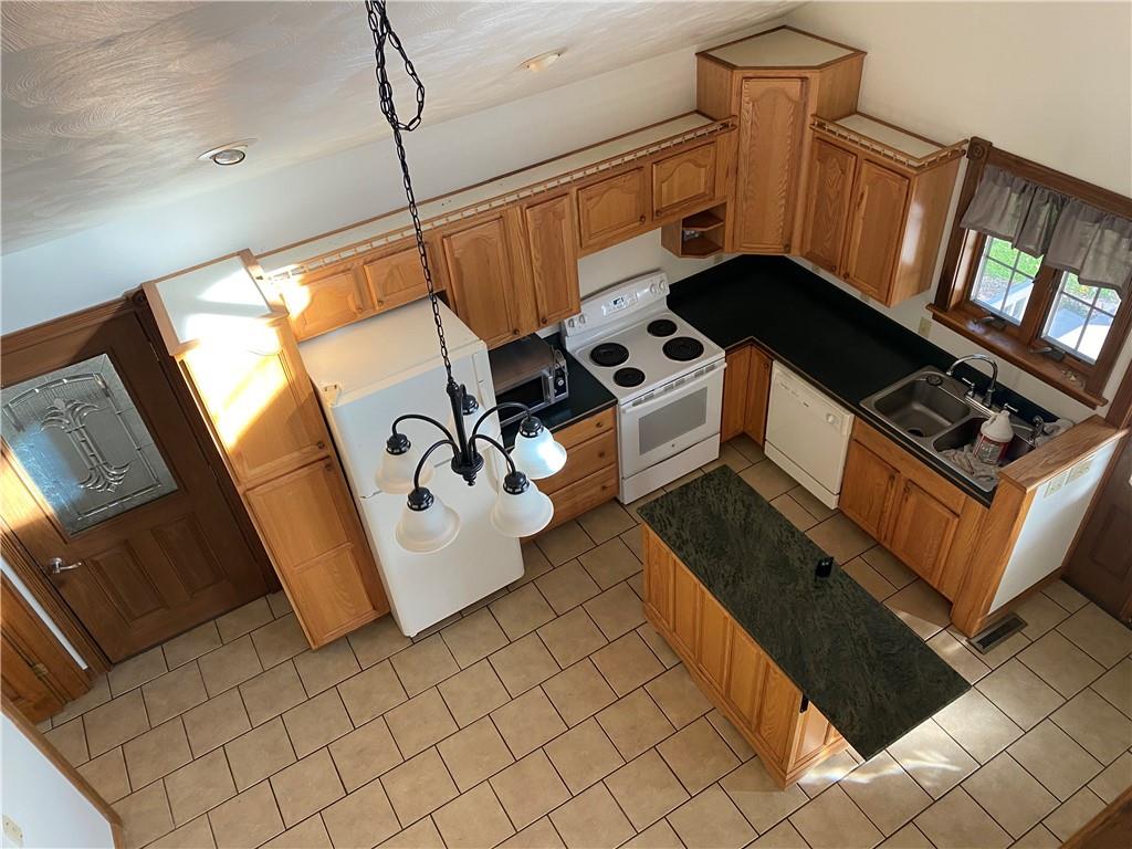 250 Lowman Road Indiana, PA 15701 - Photo 6 of 11 a utility room with dryer and washer