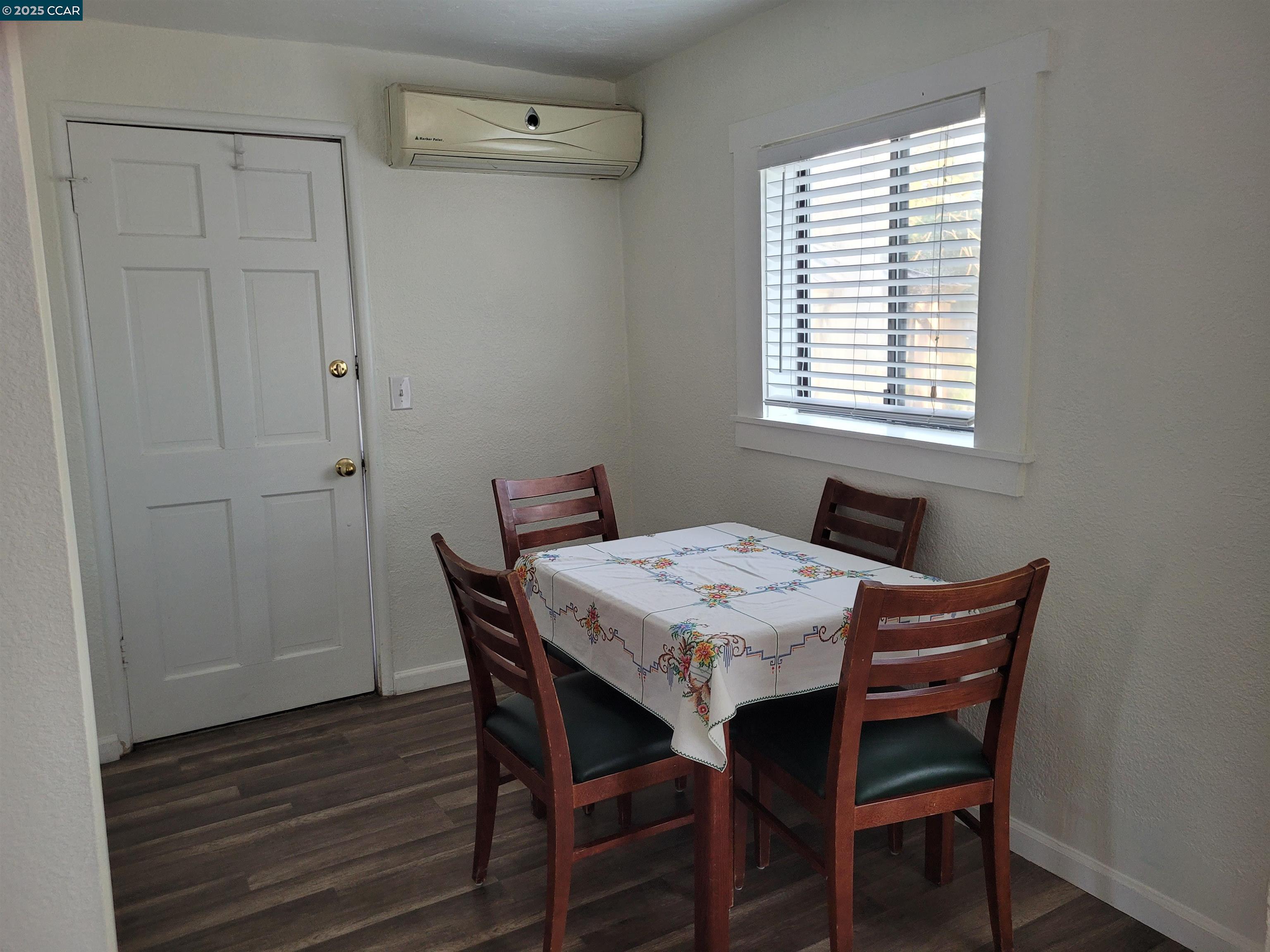 1181 Danville Boulevard, Unit E Alamo, CA 94507 - Photo 5 of 11 a view of a dining room with furniture window and wooden floor