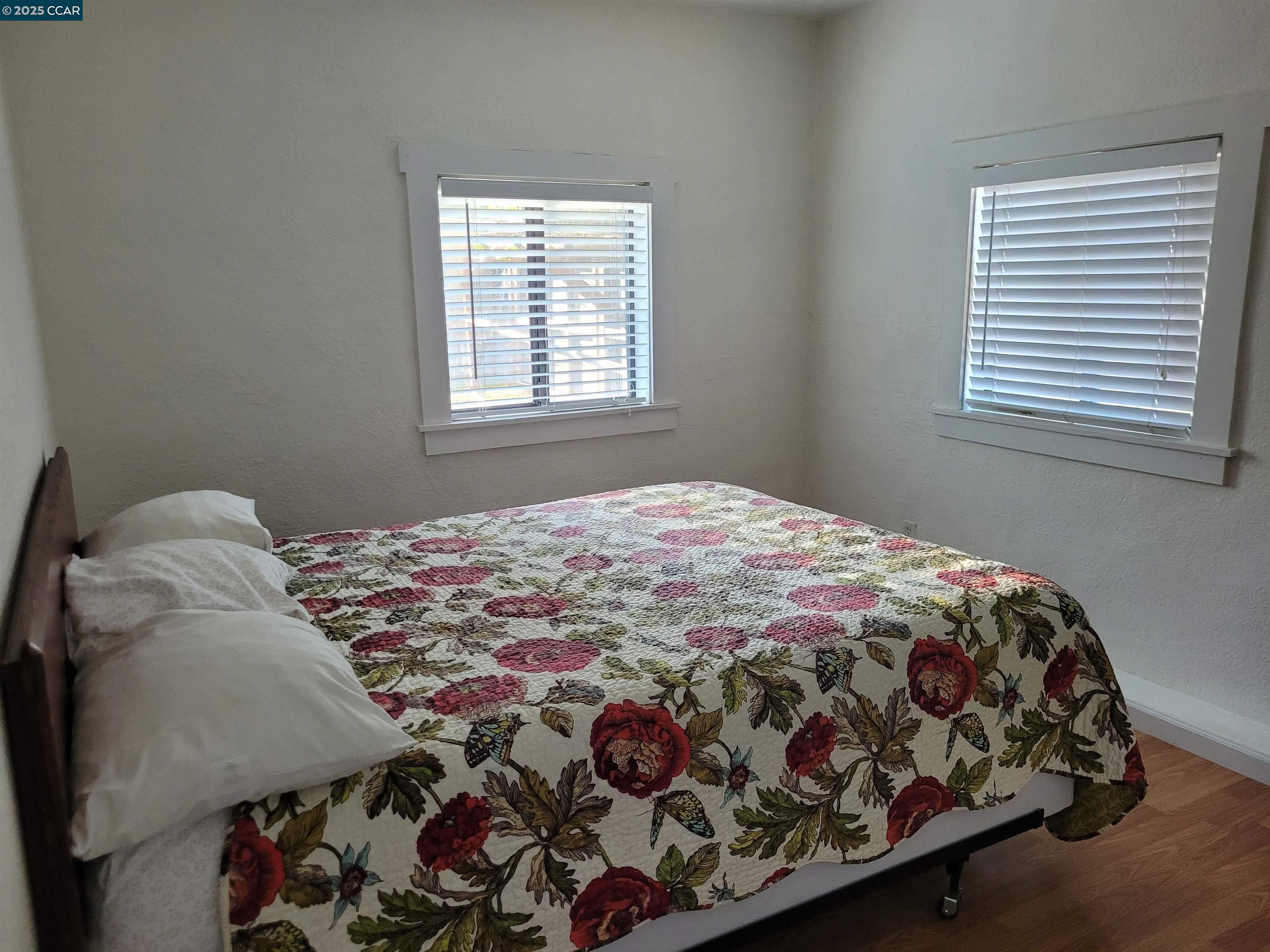 1181 Danville Boulevard, Unit E Alamo, CA 94507 - Photo 9 of 11 a bedroom with a bed and a window