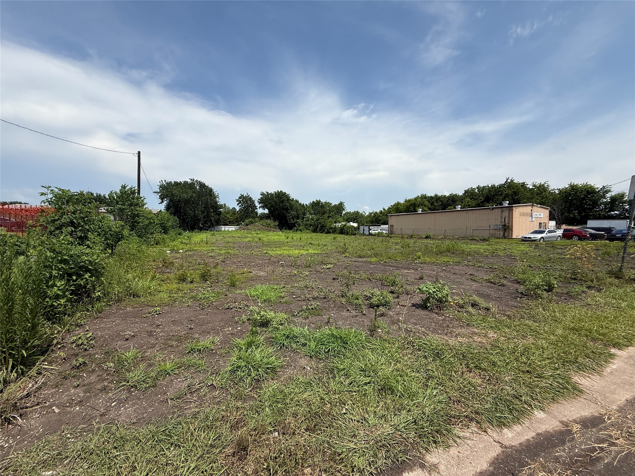 0 Hiram Clarke Road Houston, TX 77045 - Photo 6 of 10 a view of a field with an trees