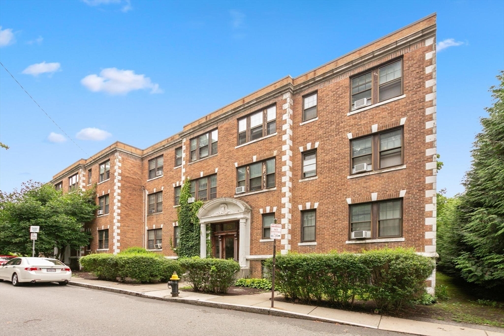 55 A Lanark Road, Unit A Boston, MA 02135 - Photo 2 of 18 a front view of a building