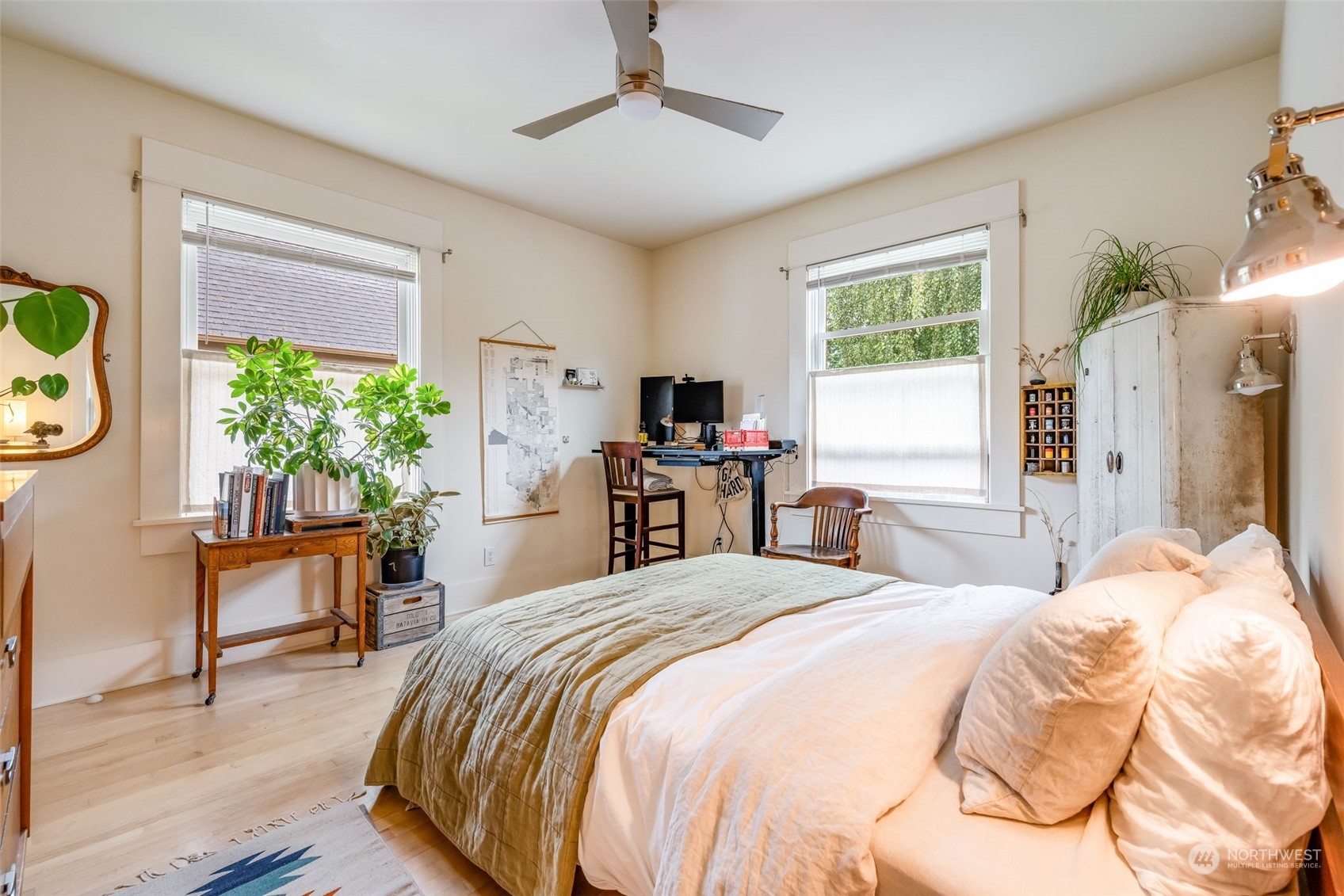 926 18th Avenue Seattle, WA 98122 - Photo 12 of 38 a bedroom with a bed and a potted plant