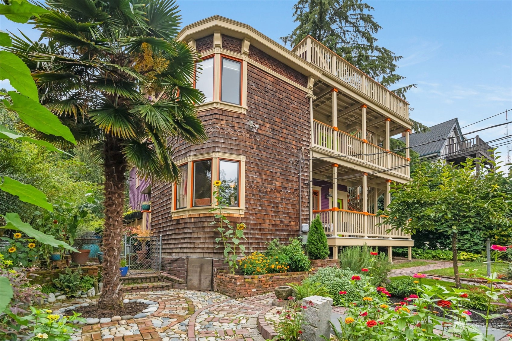 926 18th Avenue Seattle, WA 98122 - Photo 2 of 38 a front view of a house with a yard