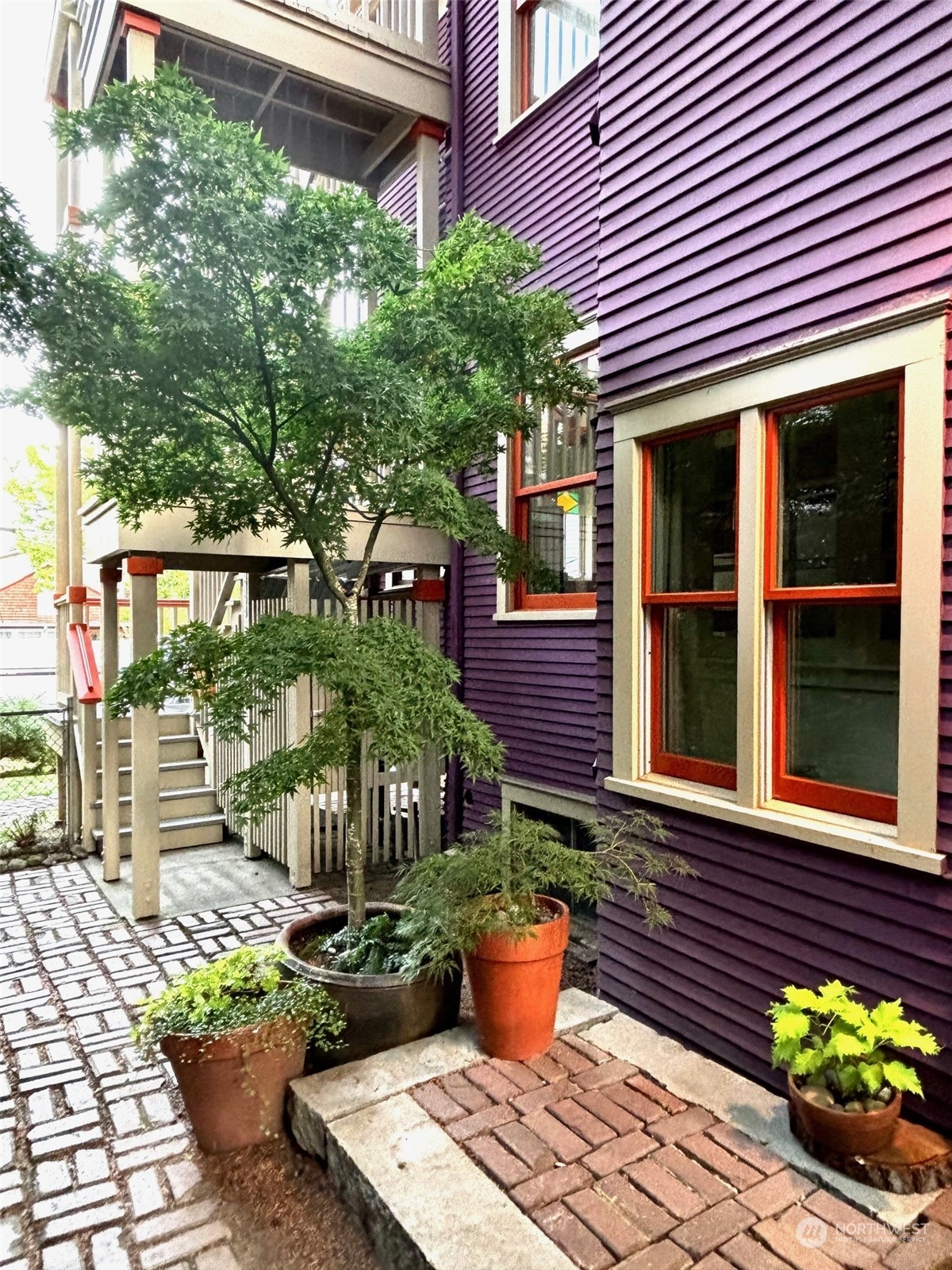 926 18th Avenue Seattle, WA 98122 - Photo 28 of 38 a front view of a house with a garden