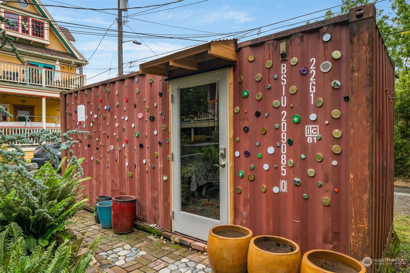 926 18th Avenue Seattle, WA 98122 - Photo 36 of 38 a couple of potted plants in front of door