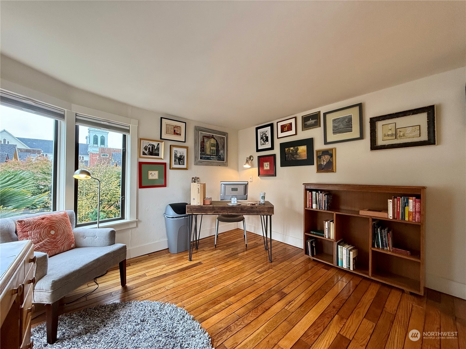 926 18th Avenue Seattle, WA 98122 - Photo 38 of 38 a living room with furniture and a wooden floor