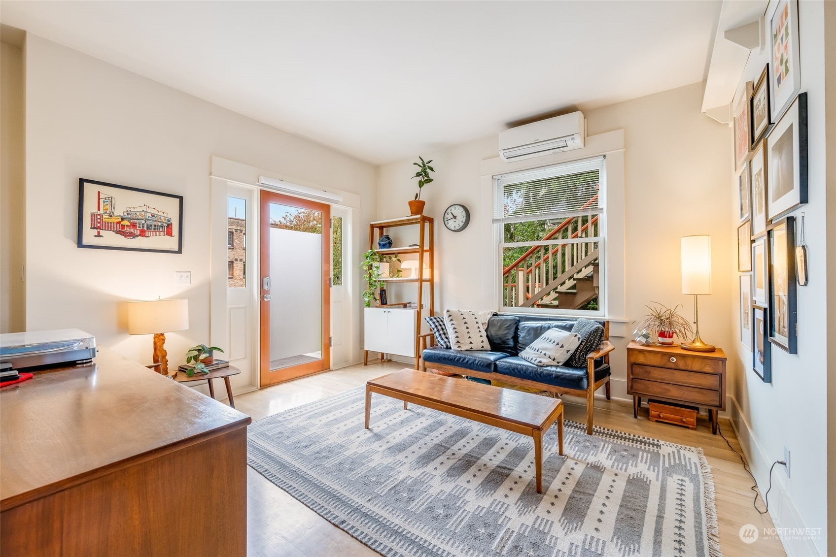 926 18th Avenue Seattle, WA 98122 - Photo 6 of 38 a living room with furniture and a flat screen tv