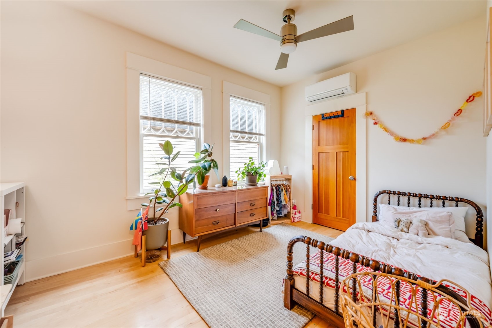 926 18th Avenue Seattle, WA 98122 - Photo 10 of 38 a bedroom with furniture and a window