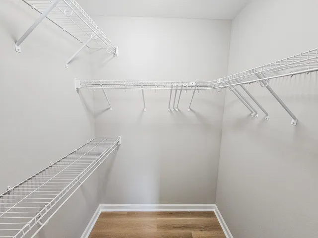 a view of a room with racks on the wall