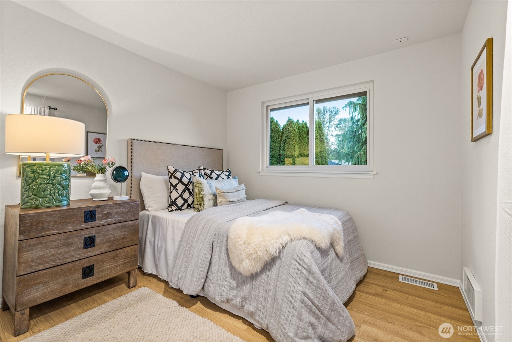 1313 228th Place Southwest Bothell, WA 98021 - Photo 12 of 23 a bedroom with a bed and a dresser