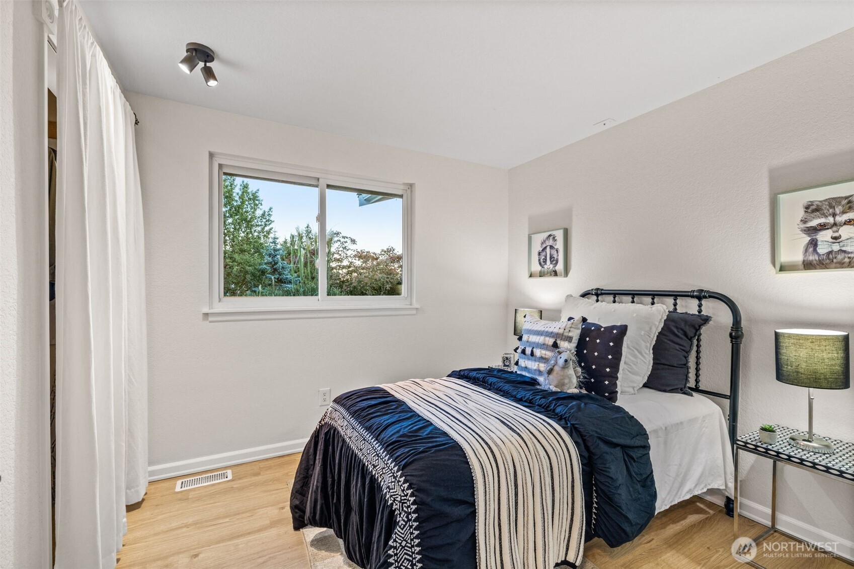 1313 228th Place Southwest Bothell, WA 98021 - Photo 13 of 23 a bedroom with a bed and a window