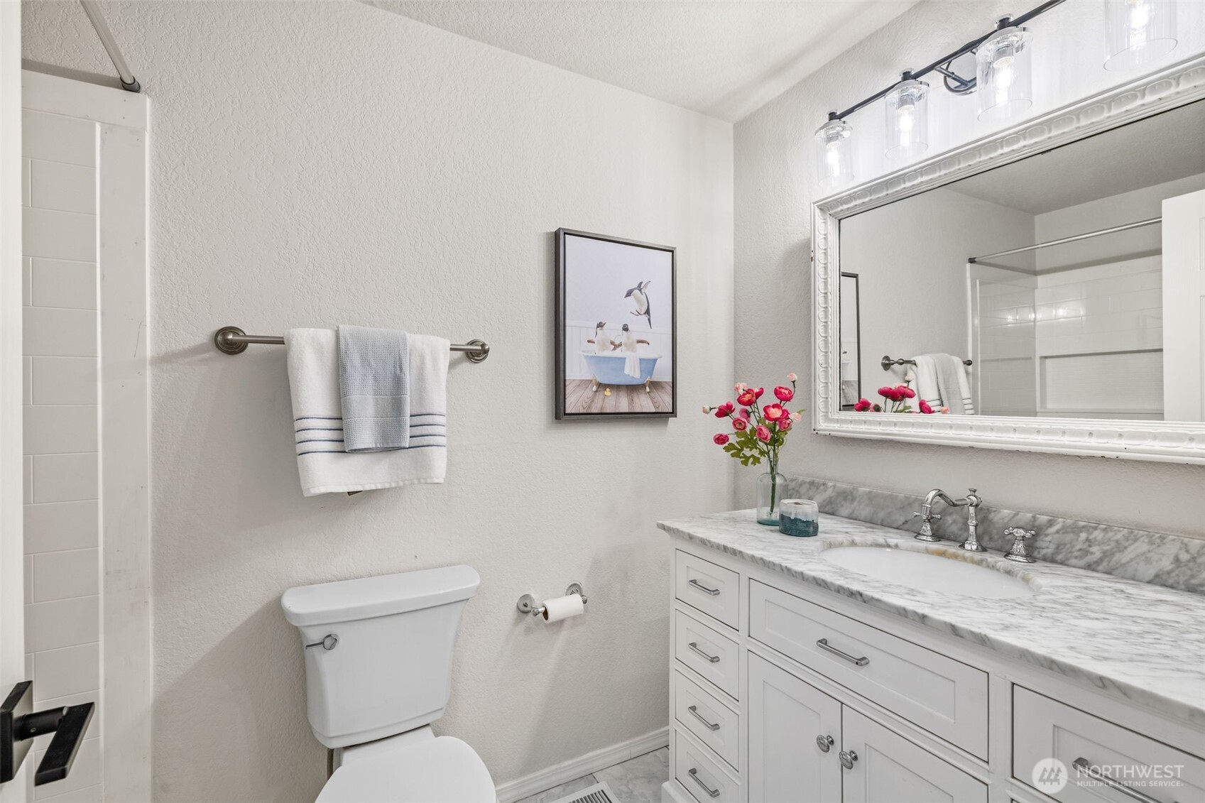 1313 228th Place Southwest Bothell, WA 98021 - Photo 14 of 23 a bathroom with a granite countertop sink mirror vanity and toilet