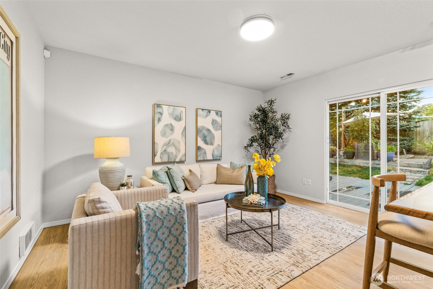 1313 228th Place Southwest Bothell, WA 98021 - Photo 16 of 23 a living room with furniture and a table