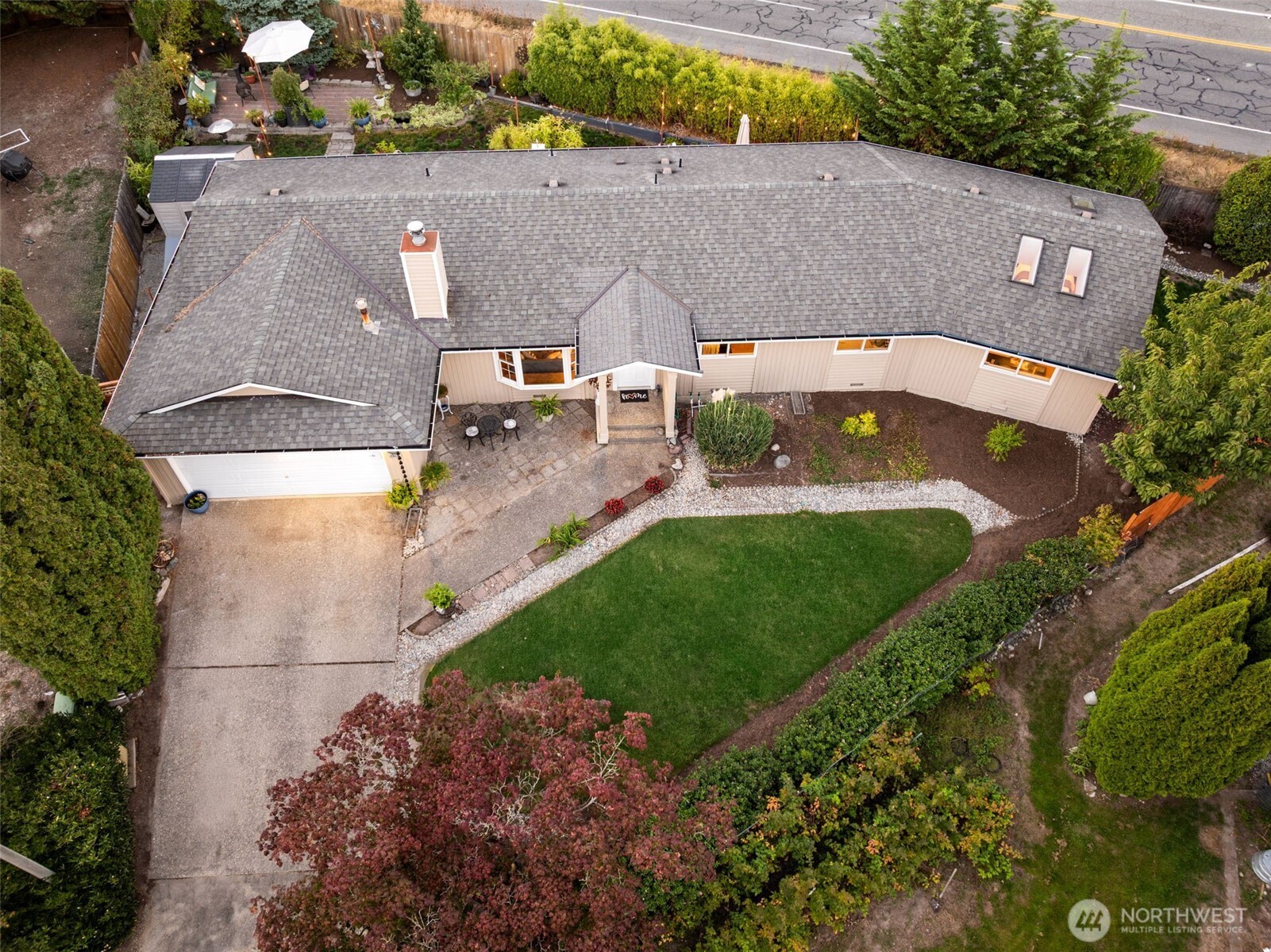 1313 228th Place Southwest Bothell, WA 98021 - Photo 23 of 23 an aerial view of a house with a yard