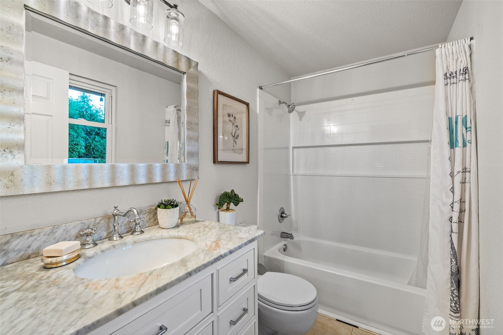 1313 228th Place Southwest Bothell, WA 98021 - Photo 9 of 23 a bathroom with a granite countertop sink toilet and shower