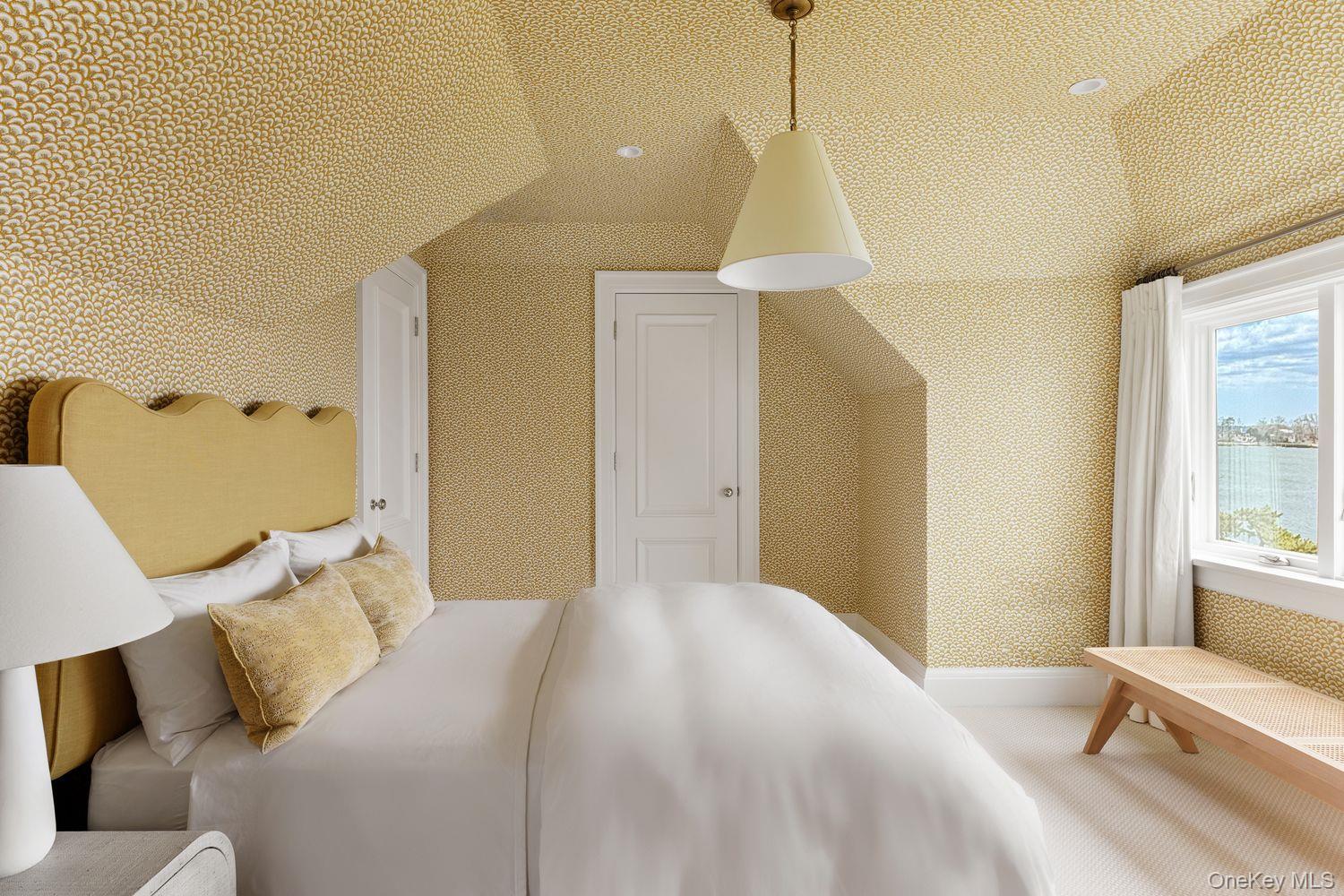 217 Hommocks Road Larchmont, NY 10538 - Photo 25 of 49 a bedroom with a bed and a window