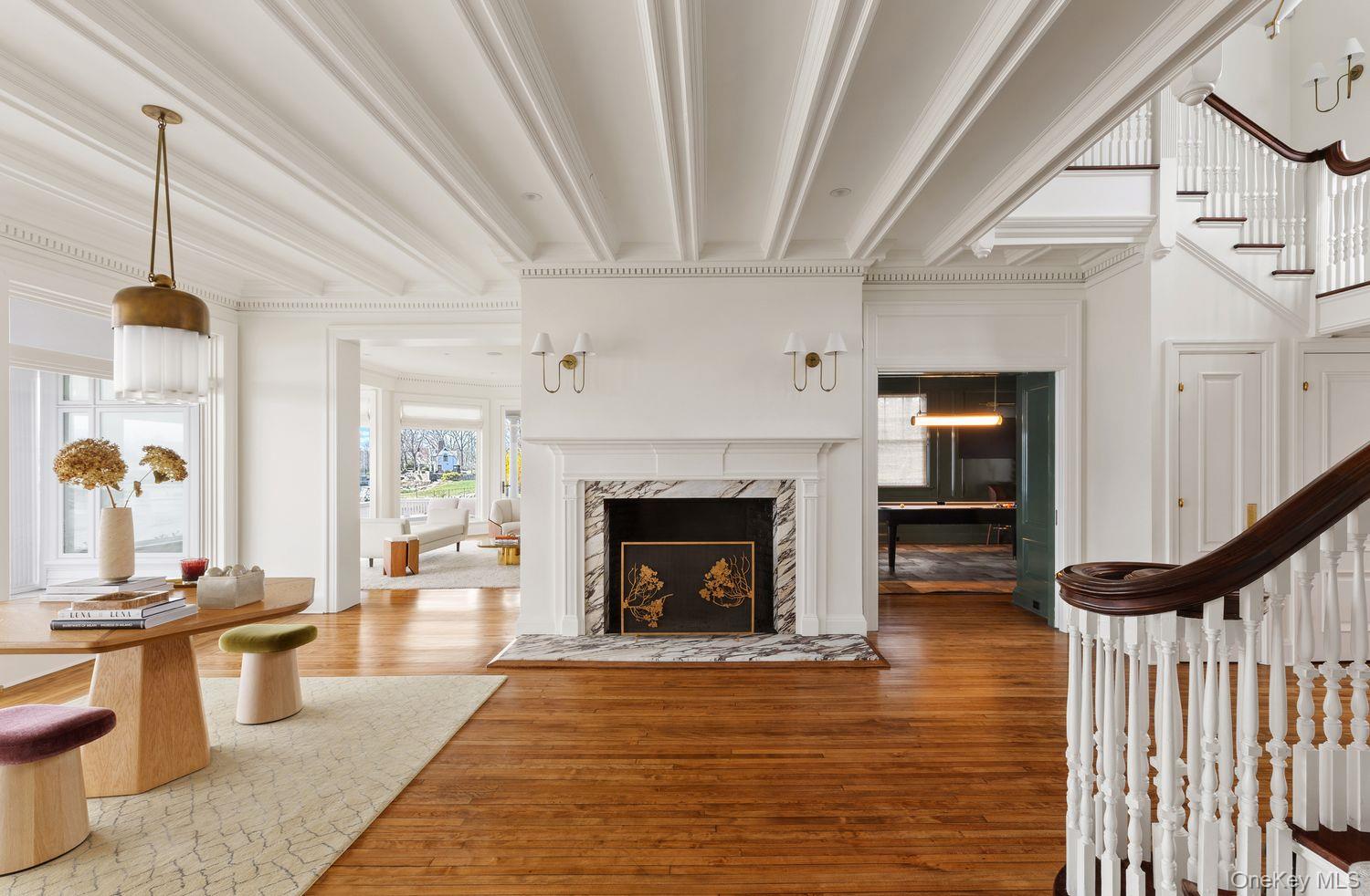 217 Hommocks Road Larchmont, NY 10538 - Photo 5 of 49 a living room with furniture and a fireplace