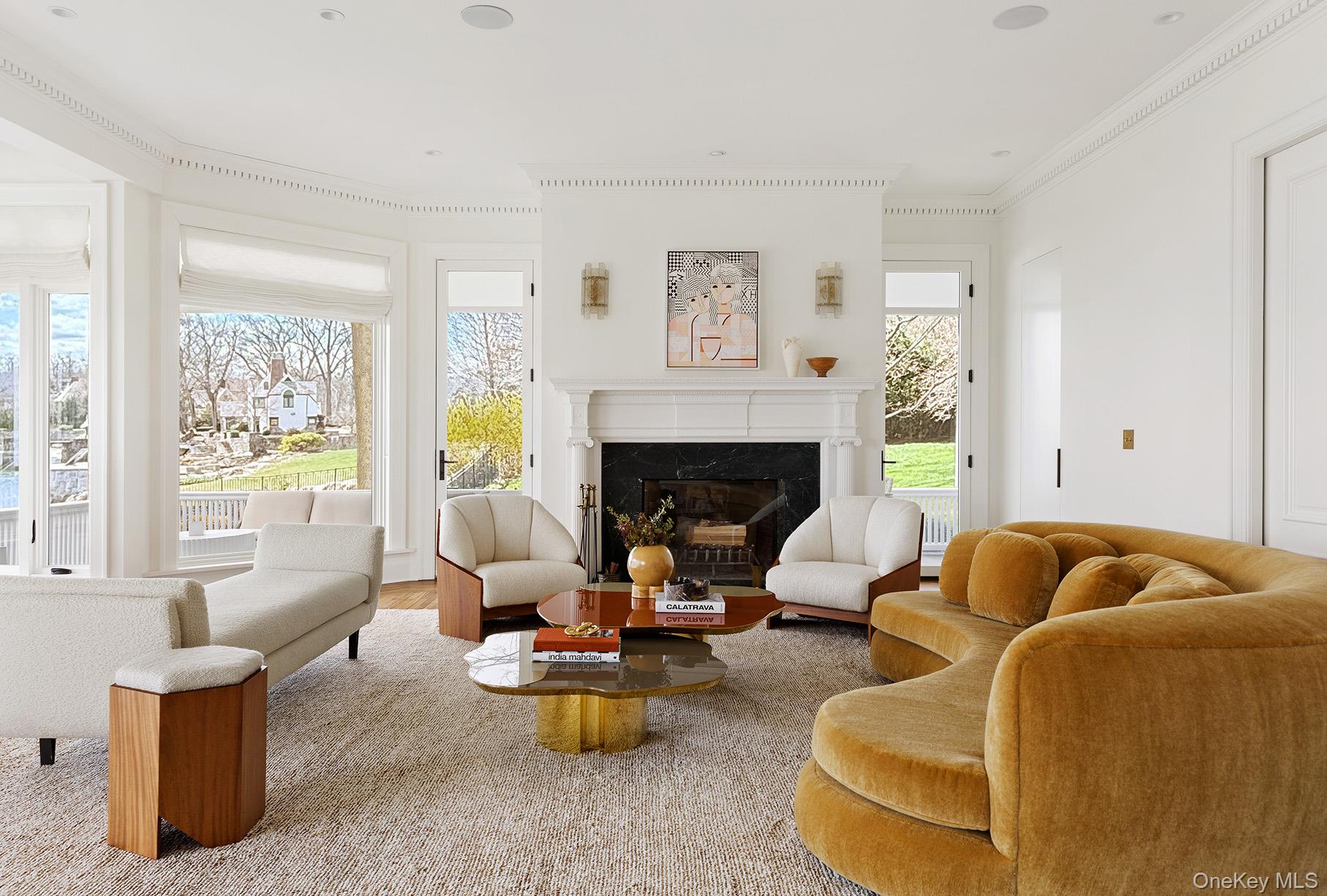 217 Hommocks Road Larchmont, NY 10538 - Photo 6 of 49 a living room with furniture and a fireplace