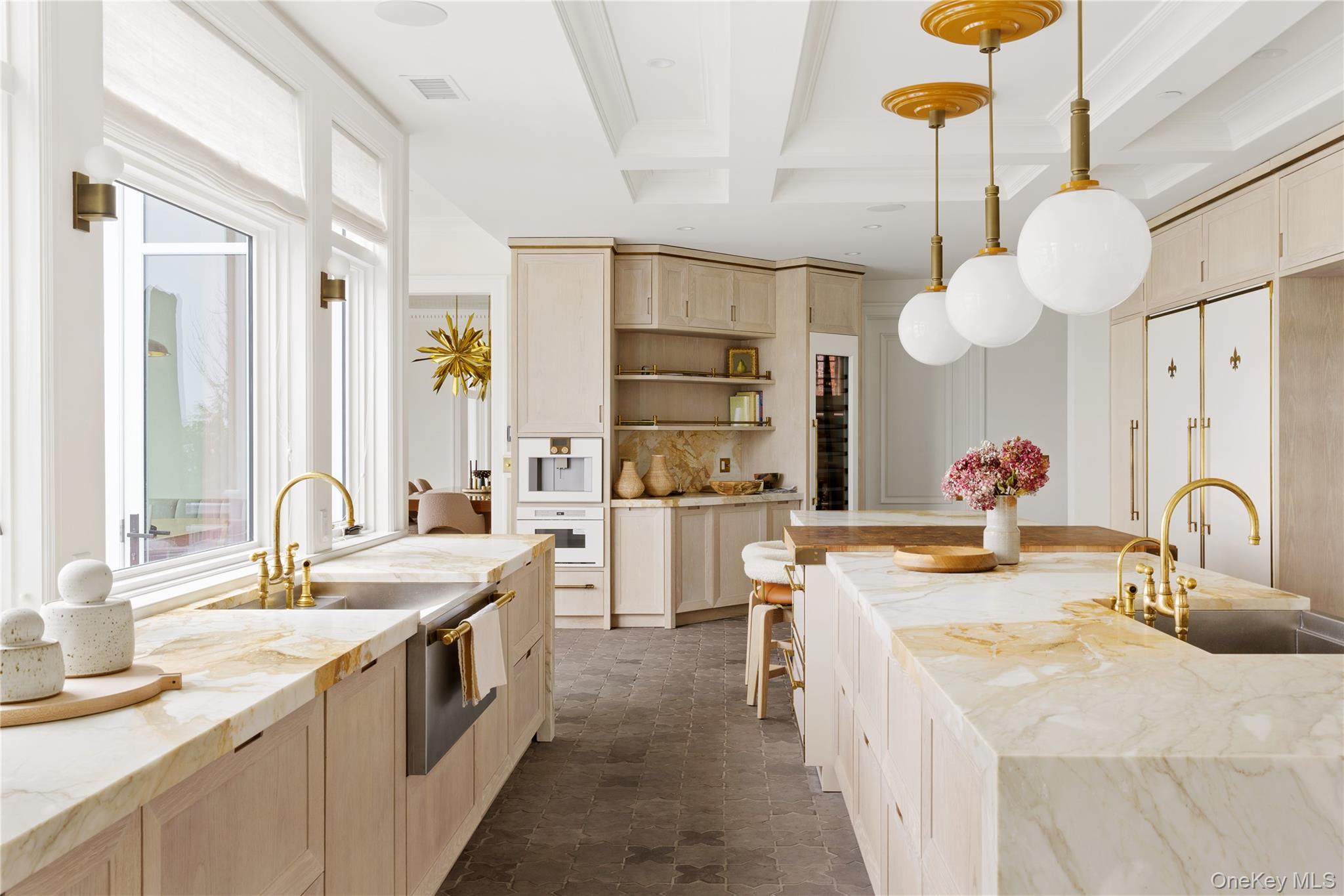 217 Hommocks Road Larchmont, NY 10538 - Photo 9 of 49 a kitchen with stainless steel appliances a sink stove and cabinets