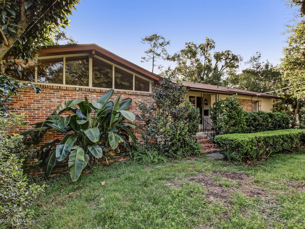 1321 Morgana Road Jacksonville, FL 32211 - Photo 1 of 44 a view of a house with a yard