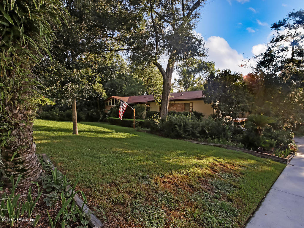 1321 Morgana Road Jacksonville, FL 32211 - Photo 2 of 44 a view of a house with a yard