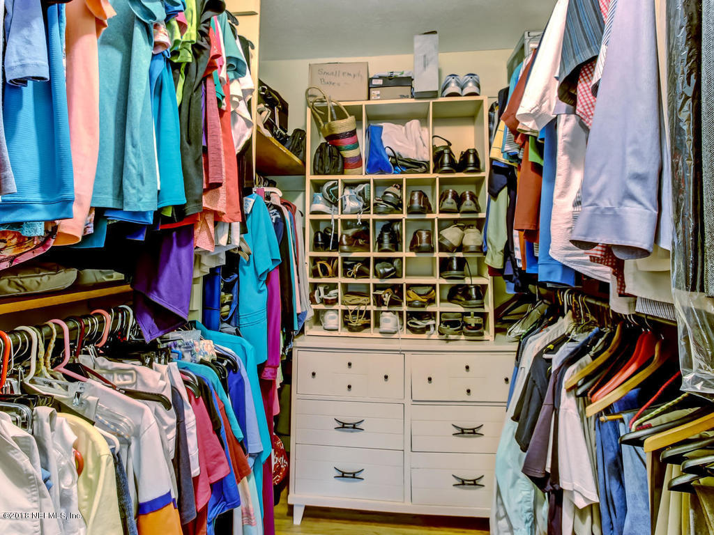 1321 Morgana Road Jacksonville, FL 32211 - Photo 21 of 44 a view of walk in closet with clothes and shoes