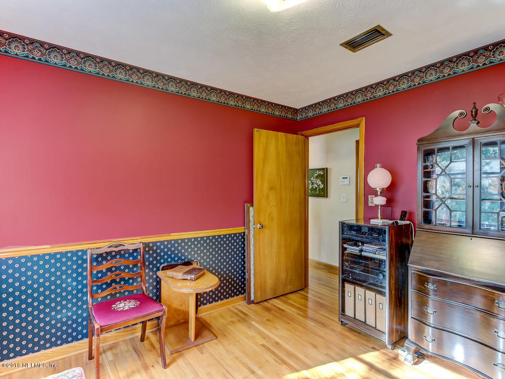 1321 Morgana Road Jacksonville, FL 32211 - Photo 24 of 44 a living room with furniture and wooden floor