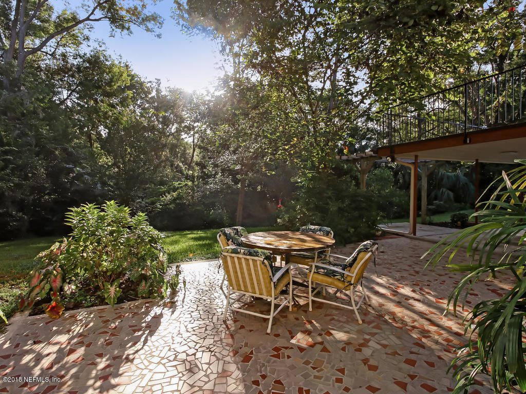 1321 Morgana Road Jacksonville, FL 32211 - Photo 37 of 44 a view of a patio with table and chairs and potted plants