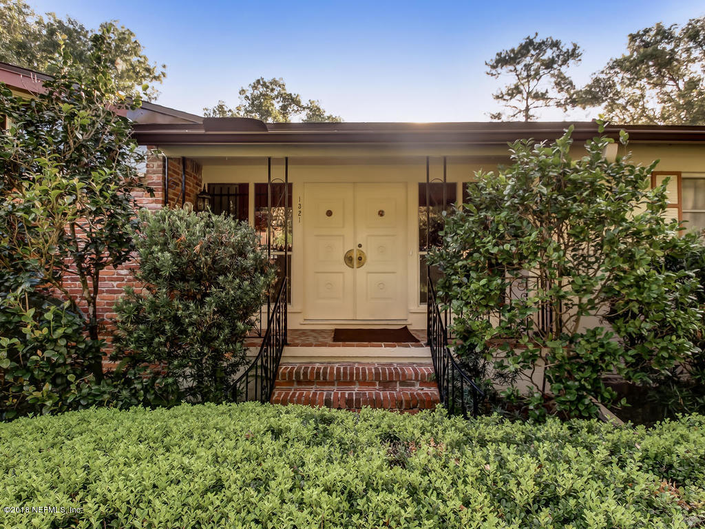 1321 Morgana Road Jacksonville, FL 32211 - Photo 4 of 44 a front view of a house with a garden