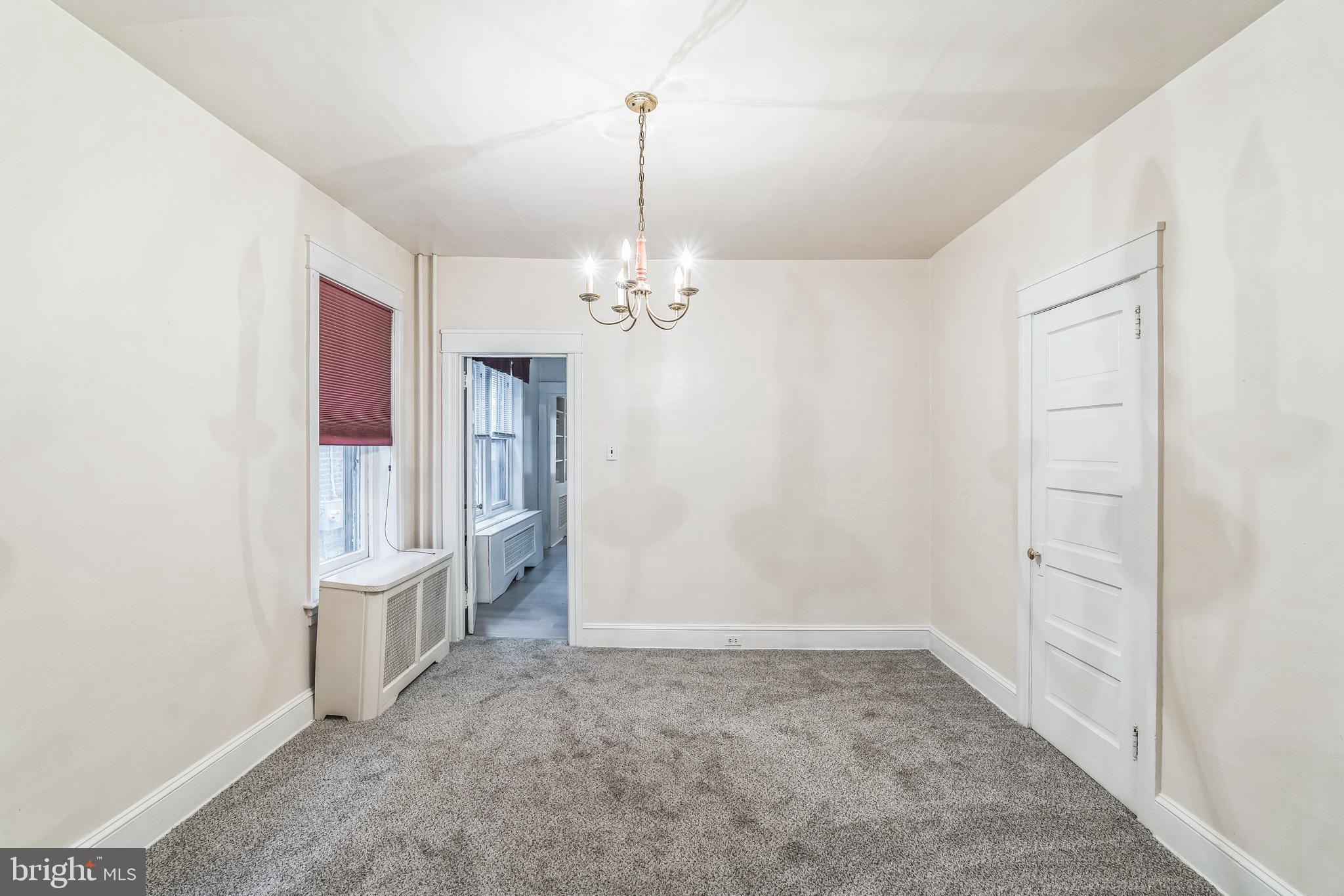 415 Rector Street Philadelphia, PA 19128 - Photo 11 of 31 wooden floor in an empty room with a window