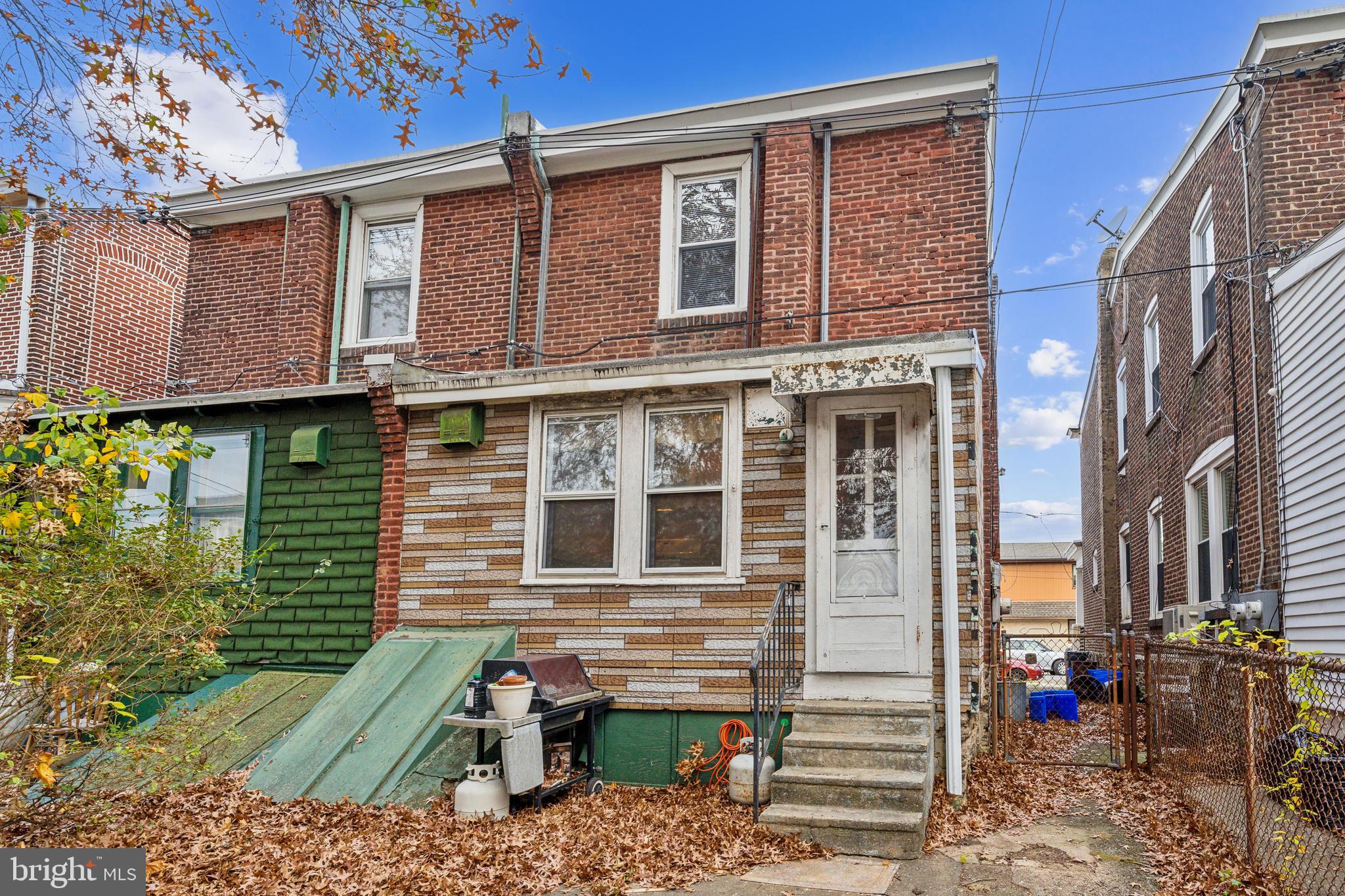 415 Rector Street Philadelphia, PA 19128 - Photo 18 of 31 a front view of a house with a yard