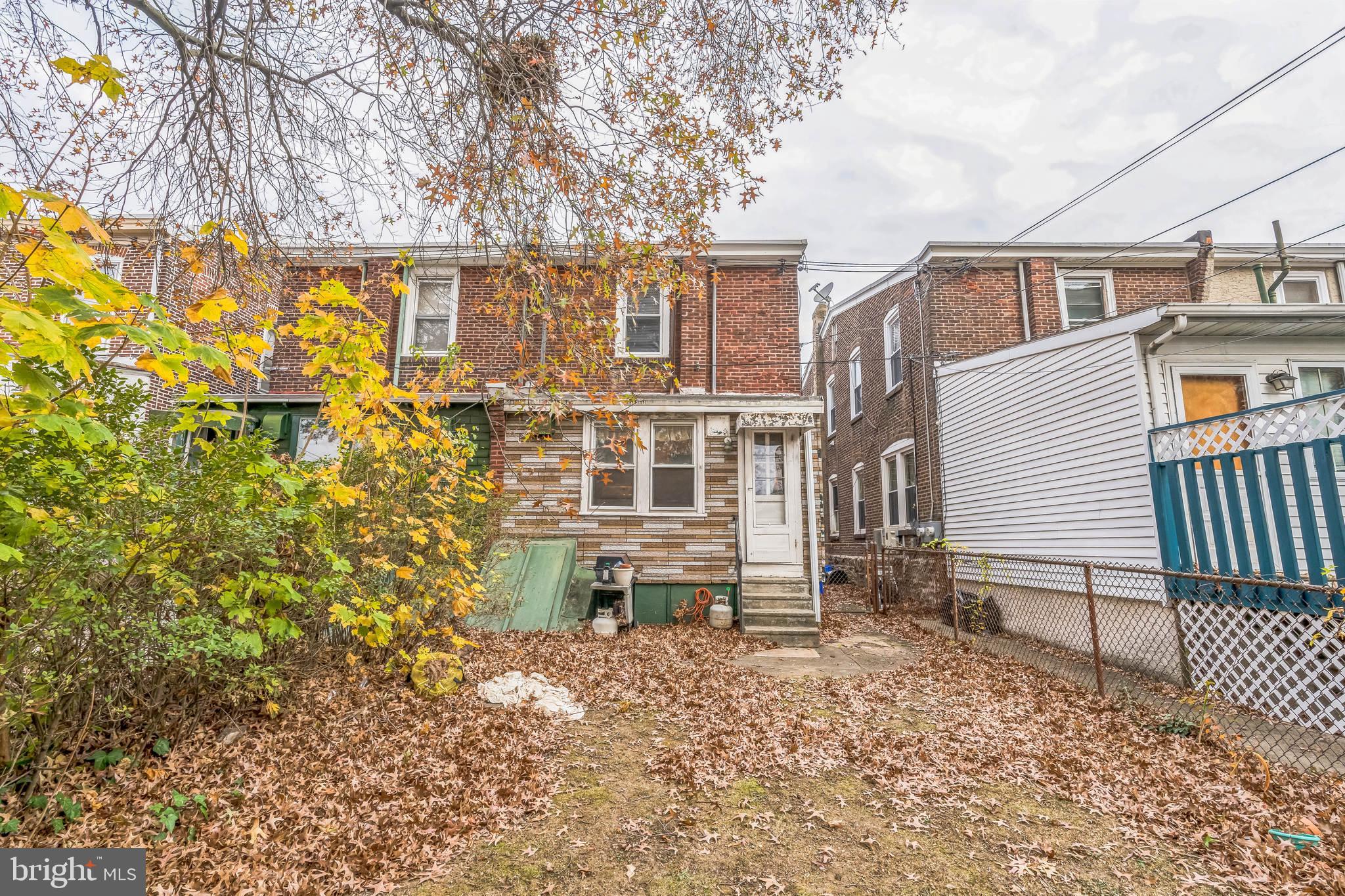 415 Rector Street Philadelphia, PA 19128 - Photo 19 of 31 a front view of a house with a yard