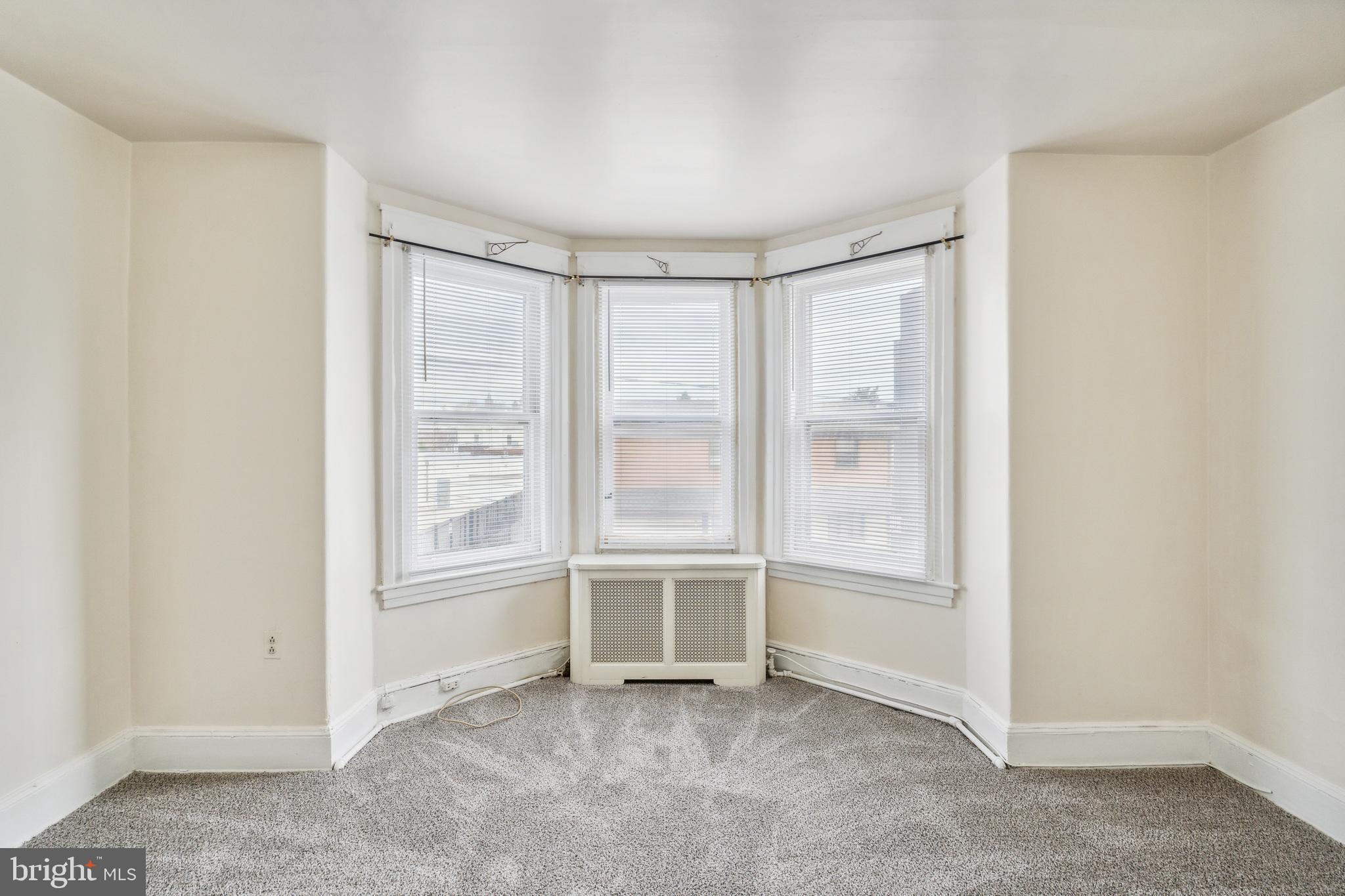 415 Rector Street Philadelphia, PA 19128 - Photo 20 of 31 an empty room with windows
