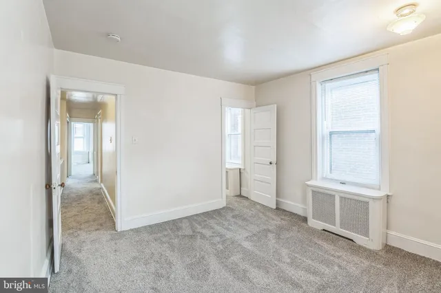 a view of an empty room and window