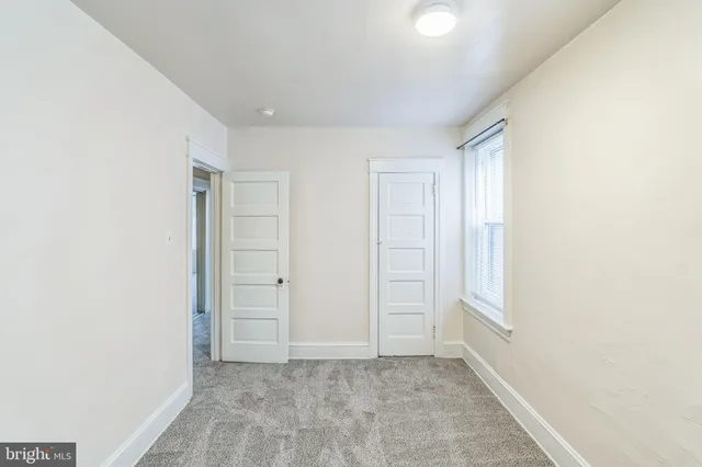 a bathroom with a toilet a sink and shower