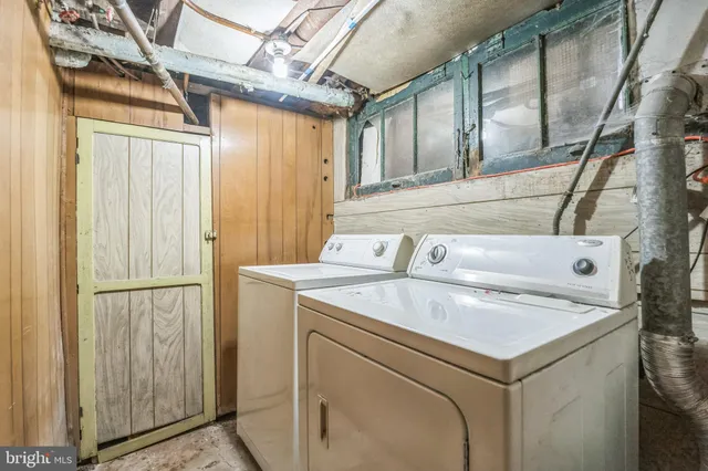 a view of hallway with wooden floor