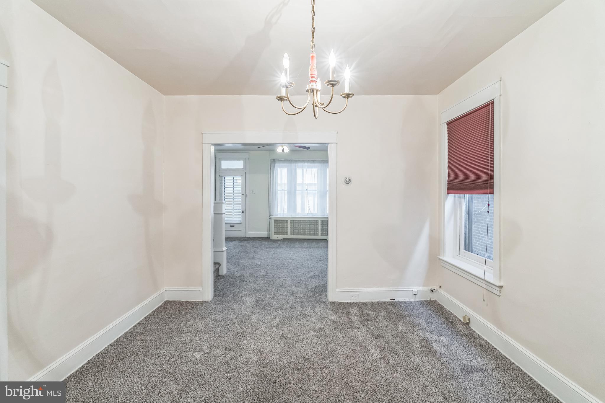 415 Rector Street Philadelphia, PA 19128 - Photo 9 of 31 wooden floor in an empty room with a window