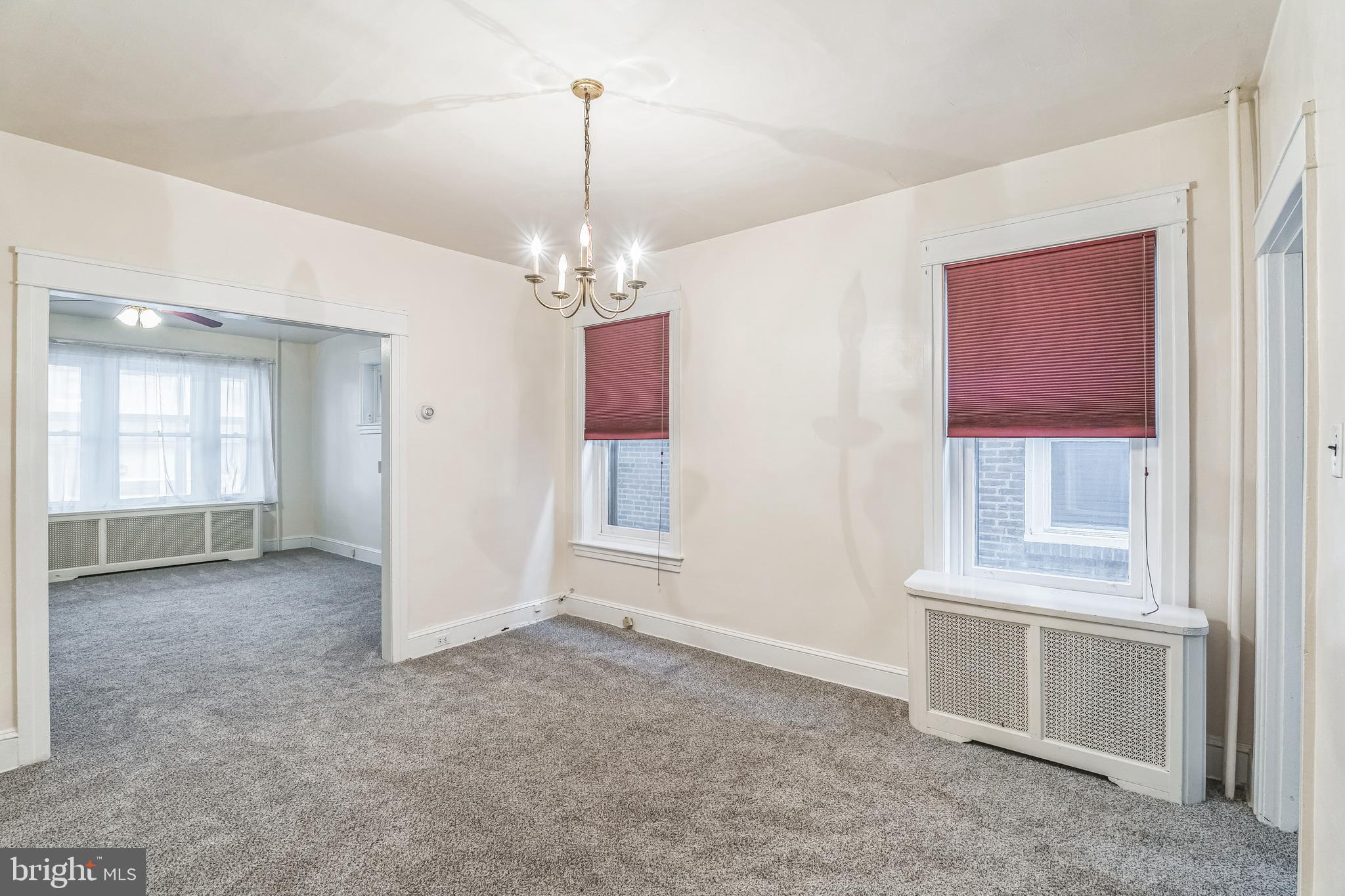 415 Rector Street Philadelphia, PA 19128 - Photo 10 of 31 a view of an empty room with a window