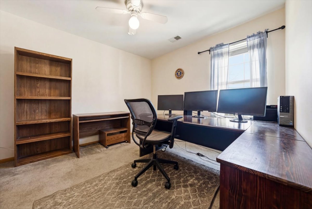 2542 Oak Tree Lane Plainfield, IL 60586 - Photo 15 of 20 a view of a workspace with furniture