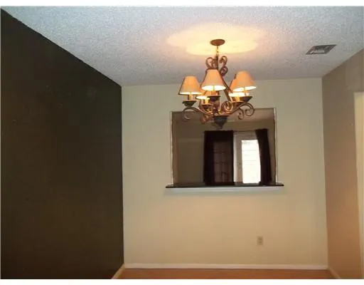 a vase of flowers sitting on a table