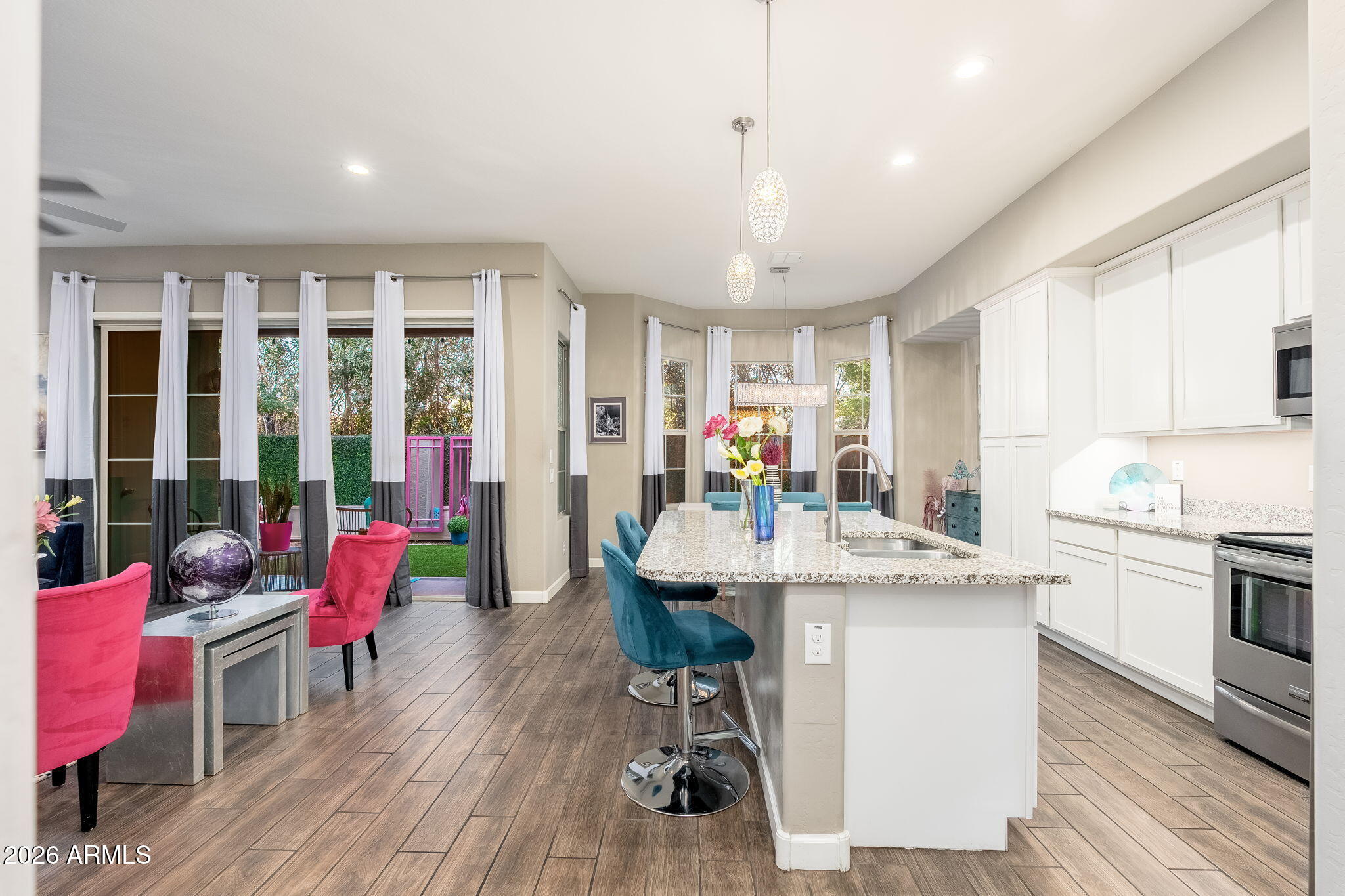 3067 North 33rd Place Phoenix, AZ 85018 - Photo 3 of 25 living & kitchen