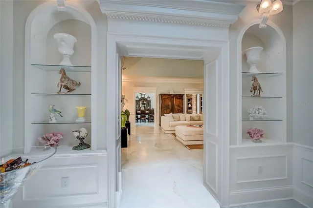 a view of living room with a fireplace and green walls