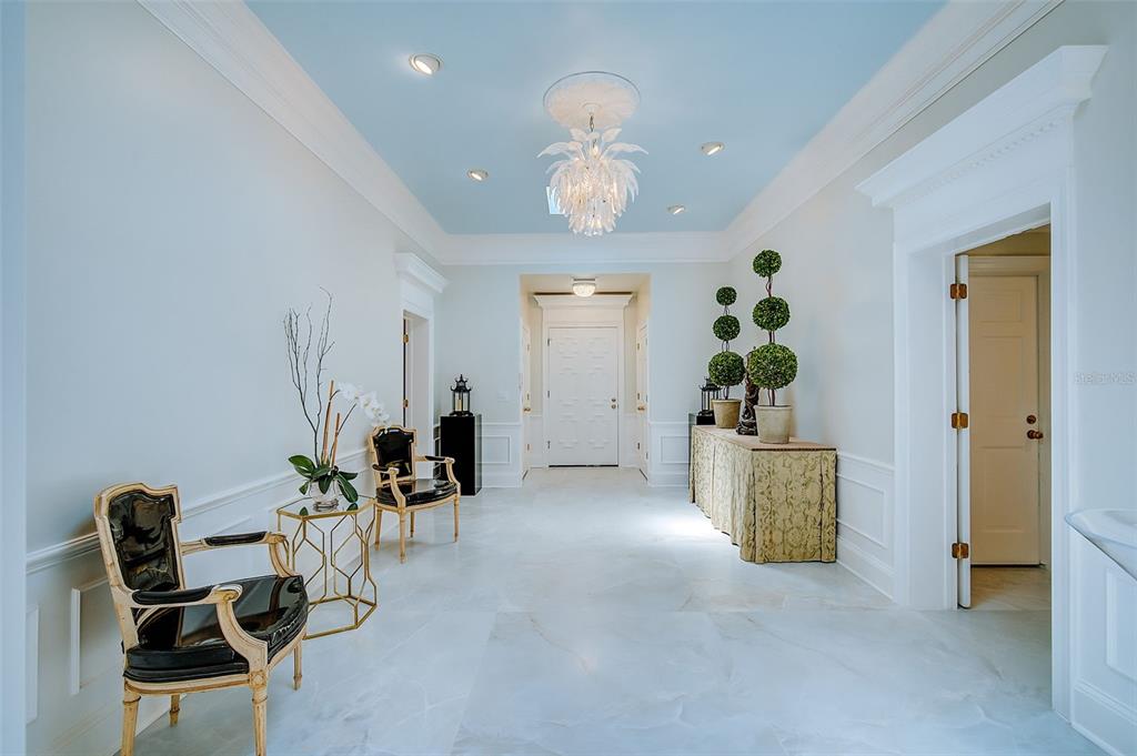 75 Osprey Point Drive Osprey, FL 34229 - Photo 13 of 92 a view of a livingroom with furniture and a chandelier