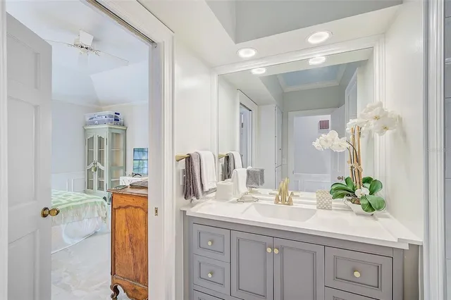 a view of a hallway with a black and white checkered floor
