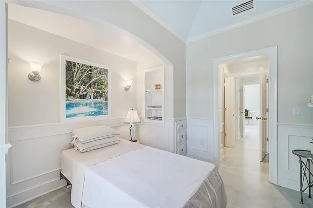 a view of a living room with furniture and garden view