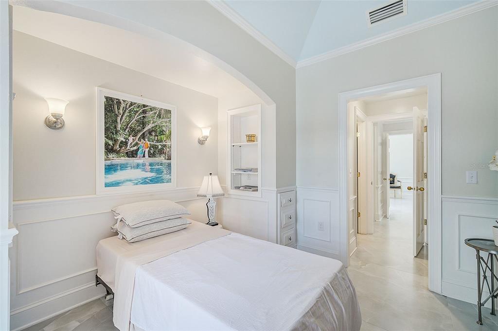 75 Osprey Point Drive Osprey, FL 34229 - Photo 44 of 92 a bedroom with a bed and a window