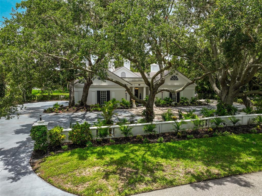 75 Osprey Point Drive Osprey, FL 34229 - Photo 7 of 92 a front view of a house with a yard